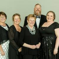 Arend D. Lubbers awardee Chick Blue posing with her family.
